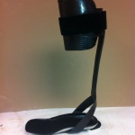 Black ankle foot orthosis with thin carbon strut