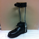 Custom ankle foot orthosis with metal uprights and shoe