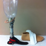Intermediate phase below knee prosthesis with diagnostic socket. Foot shell removed. Created by Practitioner Dann Goodnough